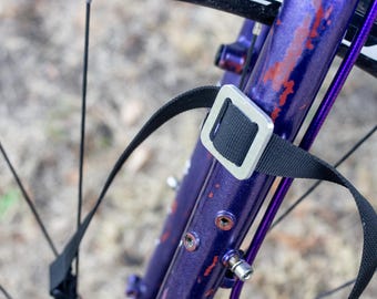Universal Cycling Bag Mount for Bikepacking, Gravel Bike Accessories & Touring. Buckle aluminium.