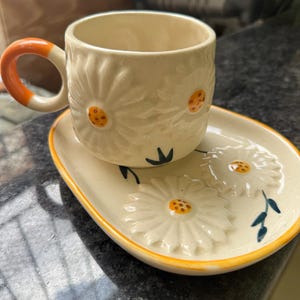 Handmade ,  ceramic handmade mug , coffee mug ,  ceramic mug flower , ceramic mug heart ,  ceramic mug and Saucer
