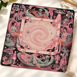 May include: A square game board featuring a central pink spiral galaxy design surrounded by four figures in retro-futuristic chairs, each accompanied by a grey alien. The board includes lava lamps, flying saucers, and disco balls in a pink and black color palette.
