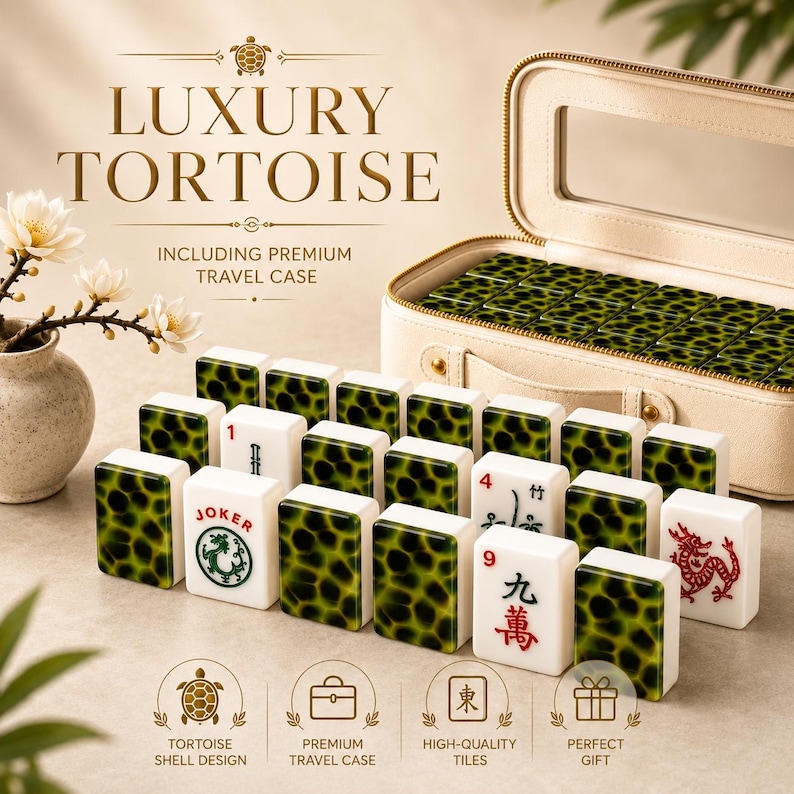 May include: A Mahjong set featuring tiles with a green and black tortoise shell pattern on the back and white faces with red and green characters, including a Joker tile, stored in a beige rectangular travel case with a clear window lid.
