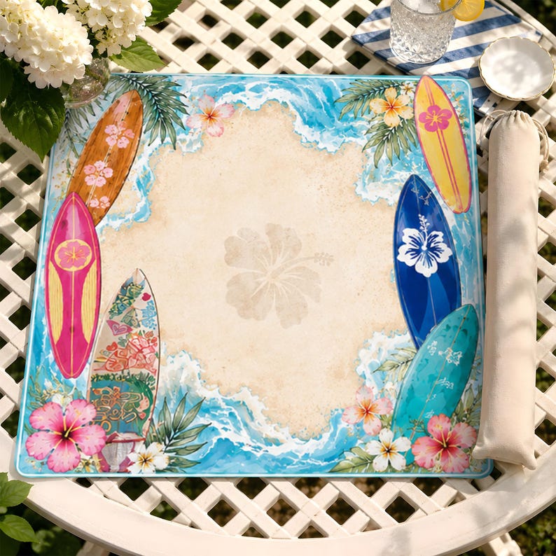May include: A square beach-themed mat featuring a central sandy area with a faint hibiscus flower print, surrounded by blue ocean waves, green palm leaves, colorful surfboards, and vibrant pink and white hibiscus flowers at the corners.