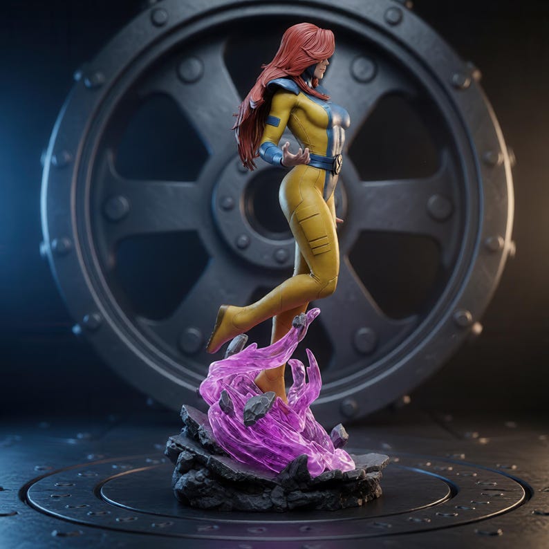 May include: A collectible figurine of a character with long red hair, wearing a yellow and blue bodysuit with a belt featuring an X emblem. The figure is posed in a dynamic stance, hovering above a base of dark rocks and translucent purple energy.