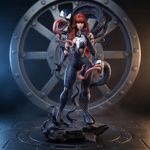 May include: A detailed collectible figurine featuring a character with long red hair wearing a black textured bodysuit with a white spider emblem. Two black symbiote creatures with sharp teeth and long pink tongues emerge from the figure's back.