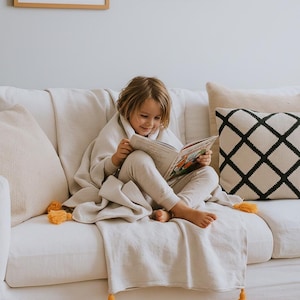 NunuSol Orange Pompom Kids Throw Blanket, Lightweight Cotton Blanket - Boho Chic Kids Room Decor, Handmade Gift