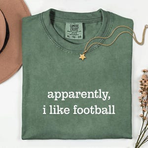 Apparently I Like Football Shirt, Funny Sports Fan Tee, Game Day T-Shirt, Football Humor Shirt, Sarcastic Football Lover Gift Tee