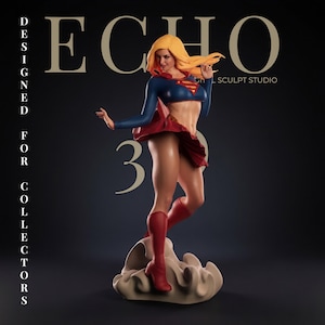 May include: A collectible figurine of a blonde superheroine with a red cape, blue long-sleeved top with a red and yellow emblem, and a red skirt. The figure wears red boots and stands on a beige base. Text reads ECHO DESIGNED FOR COLLECTORS.