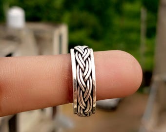 Handgemaakte sterlingzilveren Keltische knoop spinnerring, geoxideerde afwerking