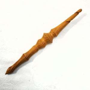 May include: A set of three ceramic mugs with a speckled, matte finish. The mugs are in shades of cream, light gray, and dark gray. Each mug has a simple, minimalist design and a rounded handle. Perfect for coffee or tea.