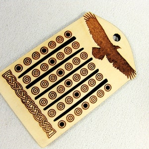 Gran Bretaña romana: lizo para tejer con bandas o cintas, telar de correa trasera en acebo con águila real