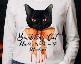 May include: White long-sleeve shirt featuring a black cat with orange eyes and a large orange bow tie. The shirt has the text "Bewitching Cat Mystery Walks in the Moonlight" in black script.