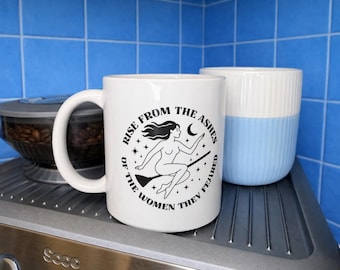 Witchy Feminist Mug “Rise from the Ashes of the Women They Feared” – Empowerment Coffee Cup, Bold Gift for Women & Friends
