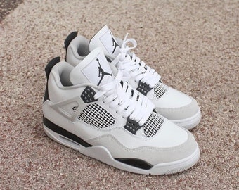 cement jordan 4 black