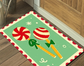Dörrmatta med julgodis, dörrmatta med pepparmyntsmotiv, dörrmatta med festlig polkagrisstång, välkomstmatta med söt jul, julmatta med grön pepparmynta