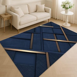 May include: A rectangular area rug with a geometric design. The rug features a deep navy blue background with intersecting lines in a lighter brown color. The rug is placed on a light-colored hardwood floor.