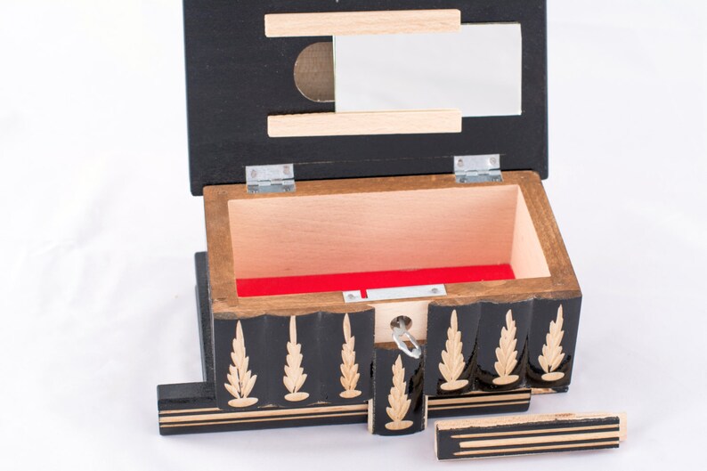 puzzle box with hidden compartment