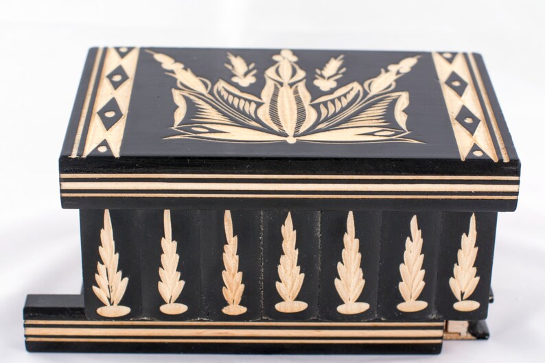 puzzle box with hidden compartment