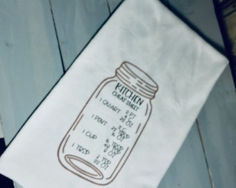 Tea towel, quart jar, cheat sheet, measurements, quart jar, kitchen conversions