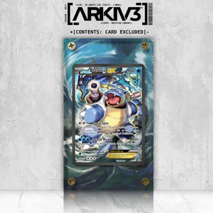 May include: A framed Pokémon trading card featuring Blastoise EX. The card is encased in a clear acrylic case with gold-colored screws. The background has a blue and green water-like design. The text on the card includes "Blastoise EX" and attack details.