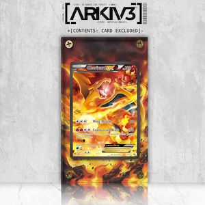 May include: A Charizard EX Pokémon card encased in a clear acrylic holder, secured with brass screws. The card features a fiery orange and yellow dragon illustration with the text "Wing Attack" and "Combustion Blast". The holder has the text "ARKIV3".