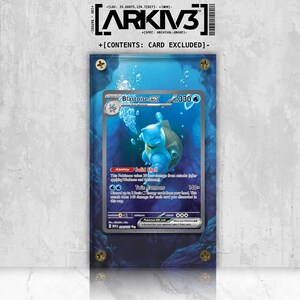 May include: A blue Blastoise EX Pokémon card encased in a clear acrylic display. The card features a blue turtle-like creature with the text "Blastoise EX" and "330". The display is secured with gold-colored screws.