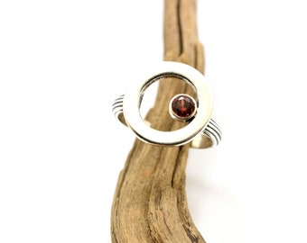 Sterling silver garnet ring, dark red stone gem perpendicular to a  circle, January birthstone gift for her