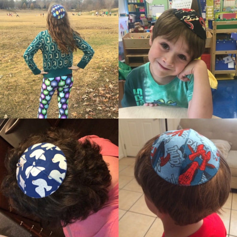 May include: Four different kippahs, or yarmulkes, with various patterns. One is blue with white doves, one is blue with a Spiderman design, one is black with a snake design, and one is blue with Hebrew writing.