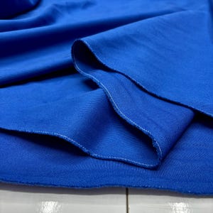 Royal blue cotton denim fabric close-up