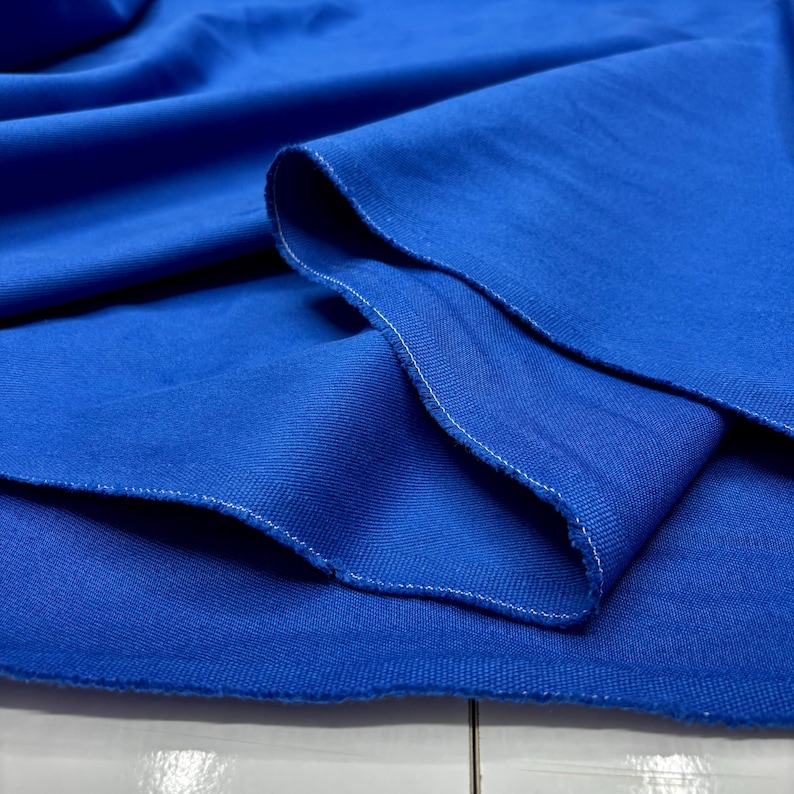 Royal blue cotton denim fabric close-up