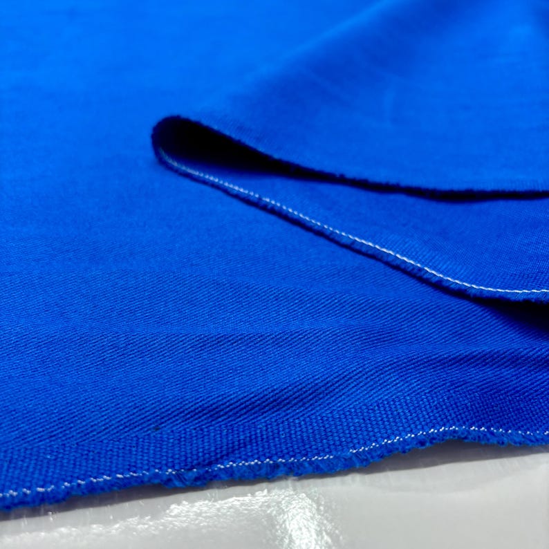 Royal blue denim cloth layers displayed