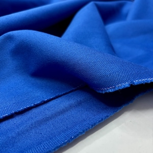 Heavy blue denim cloth folded on table