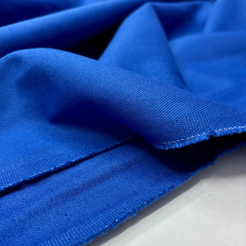 Heavy blue denim cloth folded on table
