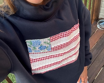 Sudadera de cuello alto con la bandera estadounidense
