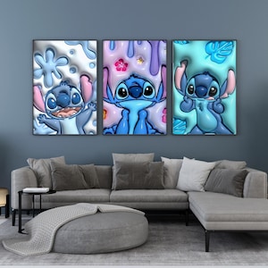 May include: Three framed wall art pieces featuring the character Stitch from Lilo & Stitch. Each piece has a different background color and Stitch pose. The artwork is in shades of blue, pink, and white, with a 3D effect.