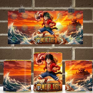 May include: A ceramic mug featuring a vibrant One Piece anime graphic of Monkey D. Luffy in a dynamic pose over a sunset ocean scene with crashing waves and a skull-shaped island. The design includes the One Piece logo and a straw hat icon.
