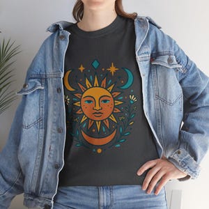 Celestial Sun and Moon Face Unisex Cotton T-Shirt, Boho Summer Top with Symmetric Orange Yellow Design, Nature-Inspired Gift