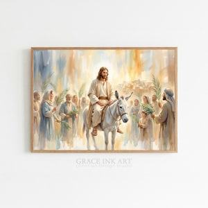Könnte beinhalten: Gerahmtes Aquarellgemälde, das eine religiöse Szene darstellt. Eine Figur in weißen Gewändern reitet auf einem weißen Esel, umgeben von Menschen, die Palmzweige halten. Der Hintergrund zeigt eine Stadt und einen warmen, goldenen Himmel. Der Text "GRACE INK ART" befindet sich unten.