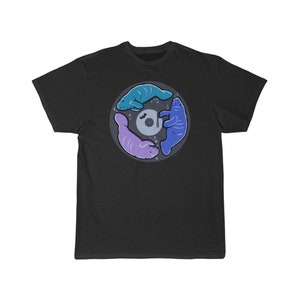 May include: A black t-shirt with a graphic of three manatees in a circle around a record player. The manatees are blue, purple, and teal.