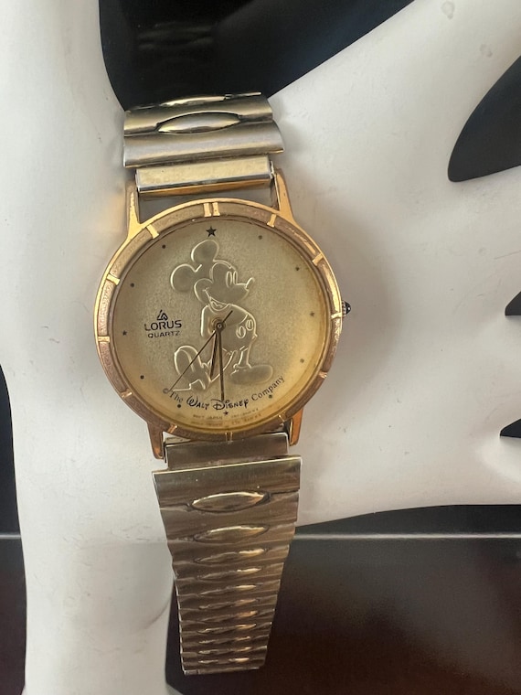 Mickey Mouse Watch, gold tone embossed Mickey