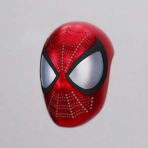 May include: A red Spider-Man mask with a metallic finish. The mask features large, silver-colored eye openings outlined in black. The mask has a pattern of small holes and a web design.