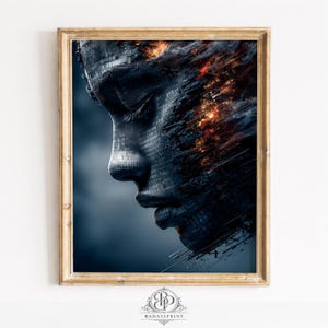 Può includere: Una stampa artistica digitale incorniciata raffigurante un profilo laterale di un volto, con codice binario ed elementi infuocati integrati nel design. L'opera d'arte è prevalentemente blu scuro e grigia, con una cornice dorata. La stampa ha il testo "BADASSPRINT" in basso.