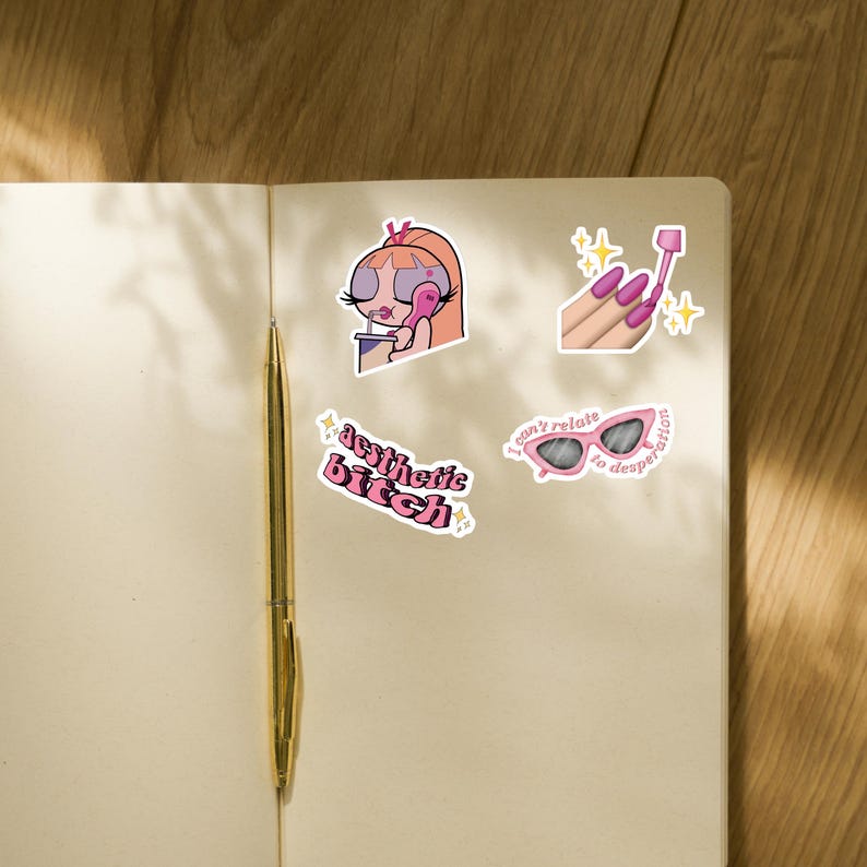 May include: A set of four vinyl stickers featuring a cartoon character on a phone, a hand applying pink nail polish, pink sunglasses with the text "I can't relate to desperation," and the text "aesthetic bitch" in a wavy pink font.