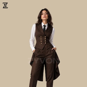 May include: A brown three-piece suit featuring a vest with gold buttons, a white collared shirt, a black tie, and matching trousers. The vest has a double-breasted design. The suit is tailored and has a classic, formal style.