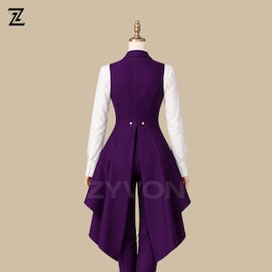 May include: A formal purple vest with a long, flowing back, paired with matching pants and a white collared shirt. The vest features two decorative buttons at the waist. The word "ZYVON" is printed on the vest. The outfit is displayed on a mannequin.