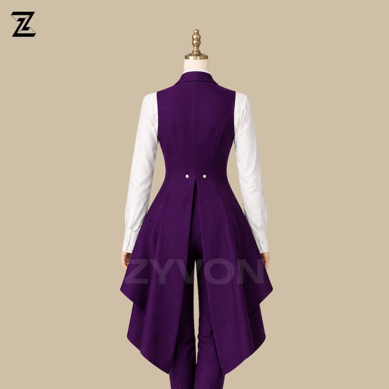 May include: A formal purple vest with a long, flowing back, paired with matching pants and a white collared shirt. The vest features two decorative buttons at the waist. The word "ZYVON" is printed on the vest. The outfit is displayed on a mannequin.
