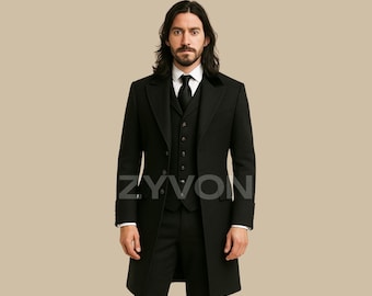 May include: A black three-piece suit with a long coat. The suit includes a vest, dress pants, and a long coat with a velvet collar. The brand name "ZYVON" is visible on the coat. The person is wearing a white dress shirt and black tie.