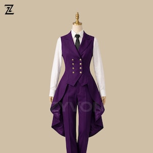 May include: A formal purple suit with a vest, pants, and a white collared shirt. The vest has gold buttons and a unique flared design. A black tie completes the outfit. The suit is displayed on a mannequin.