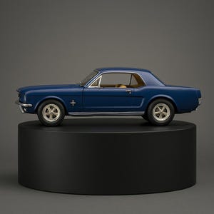 May include: A detailed model of a classic blue coupe car with gold-colored wheels. The car is displayed on a black cylindrical stand against a gray backdrop. The car features chrome accents and a tan interior.