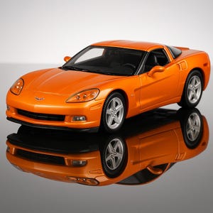 5&quot; 2007 Chevrolet Corvette Z06 Diecast Model Toy Car 1:36 Chevy ORANGE