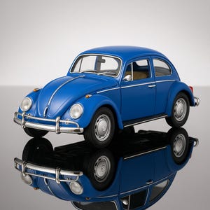 May include: A blue vintage-style toy car with chrome accents, including the front bumper, headlights, and side trim. The car has a rounded body, classic design, and is reflected in the glossy surface below.