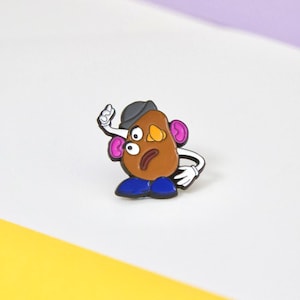 Potato Head Picasso Enamel Pin - lapel badge pop culture - Toy Story Pixar movie film tv 90s design gift